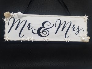 Bride and Groom sign